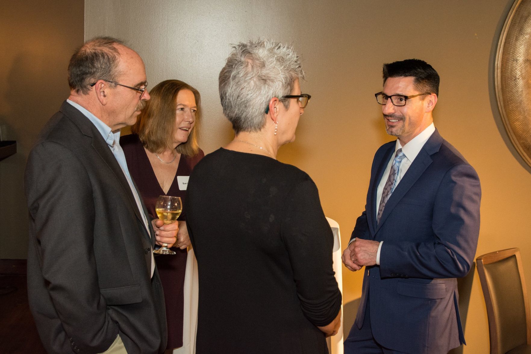 Guests mingle at the event